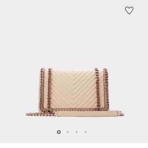 Quilted rose gold purse